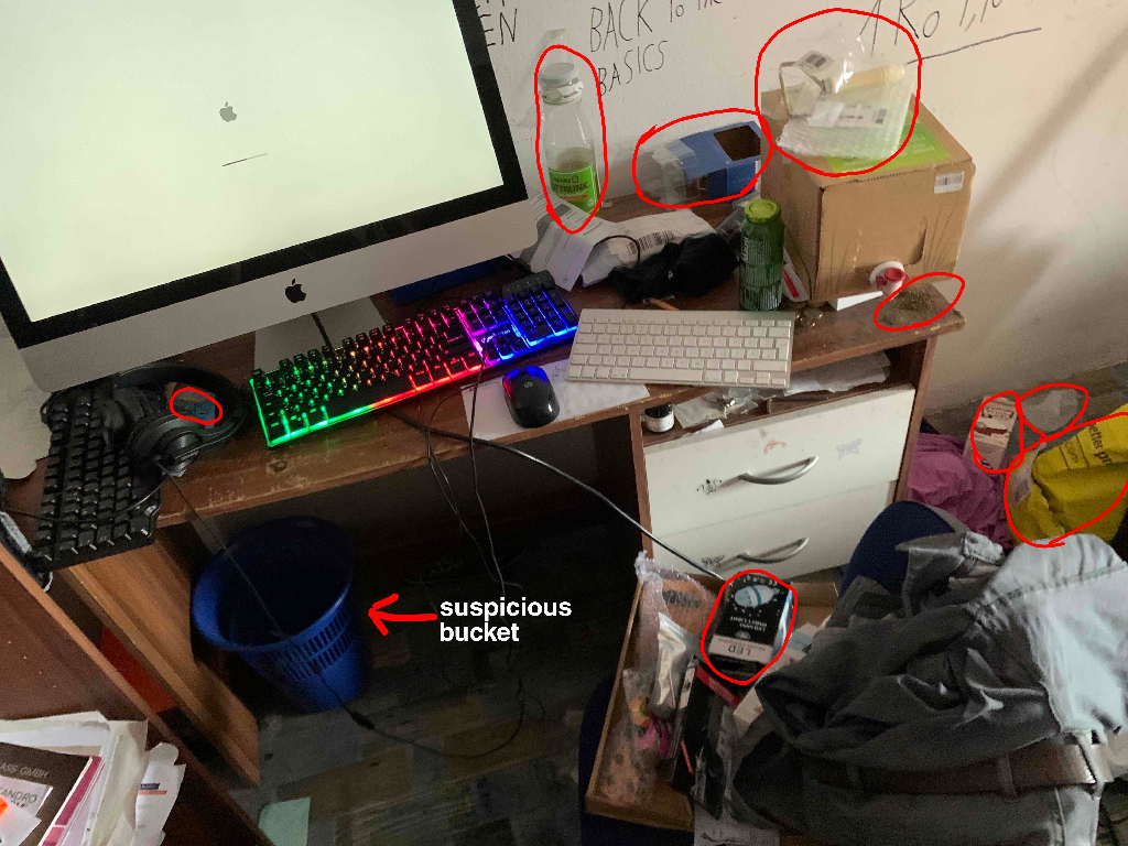 picture of a messy room with the trash highlighted in red circles