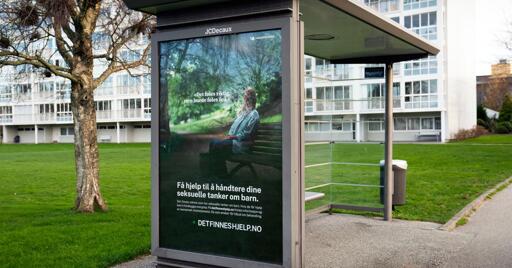 A bus stop in Stavanger showing an ad for a chat service run by the Norwegian government for pedophiles to seek therapy.