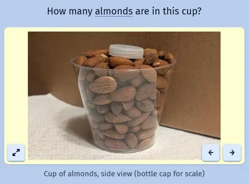 A screenshot of the daily game Estimate Me showing a picture of a cup filled with almonds and a bottle cap on top