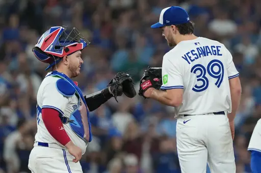 Kirk and Yesavage dap up at some point between pitches in Trey's awesome Game 6 start